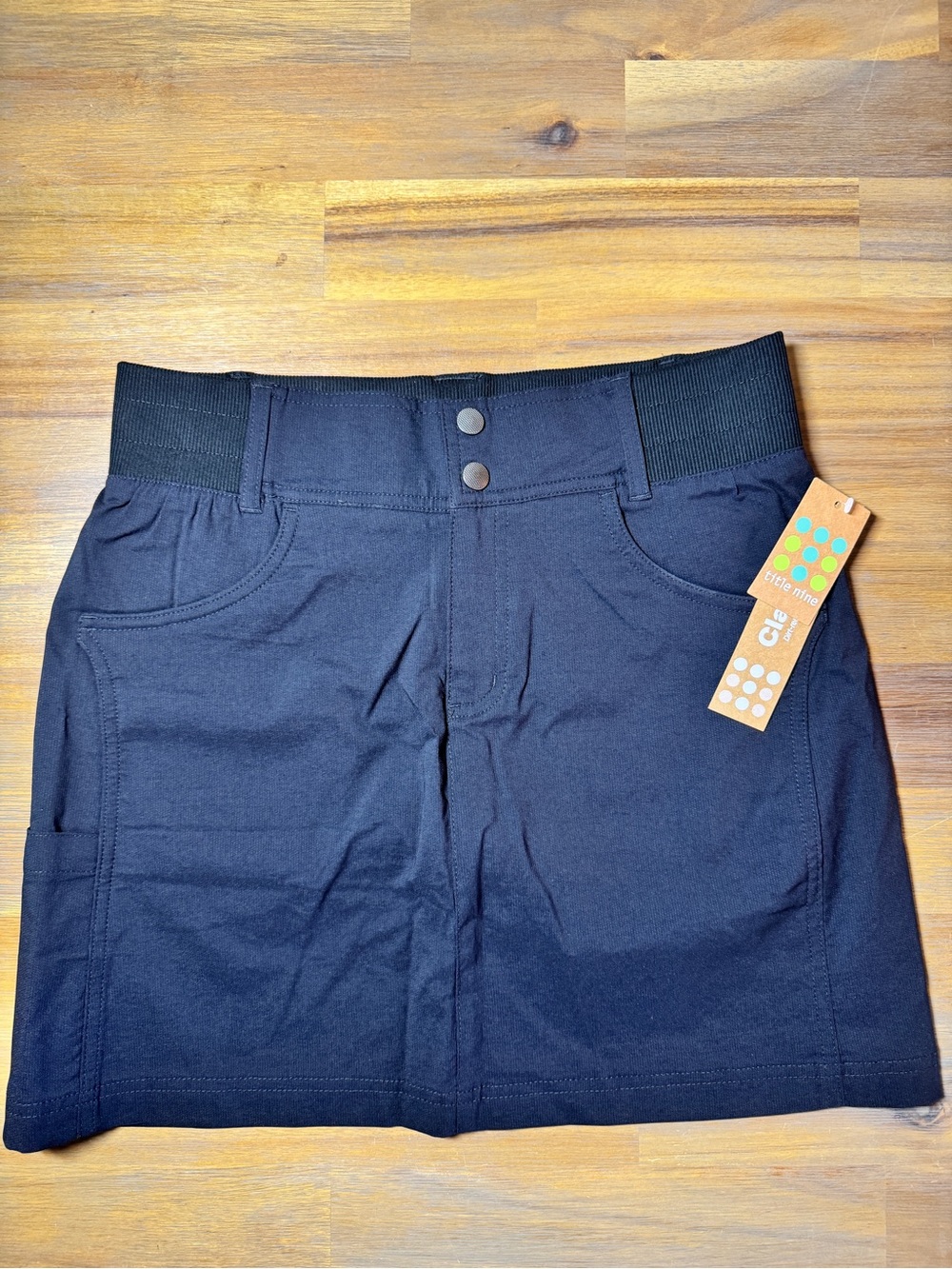 Title Nine: Clamber 2.0 Black Skort with mesh shorties. Size 2